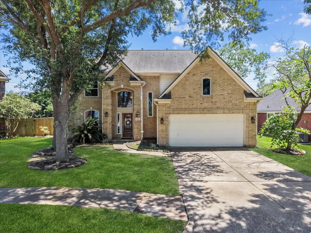 Image 2: Welcome to 1409 Mija Ln! Beautiful two-story brick