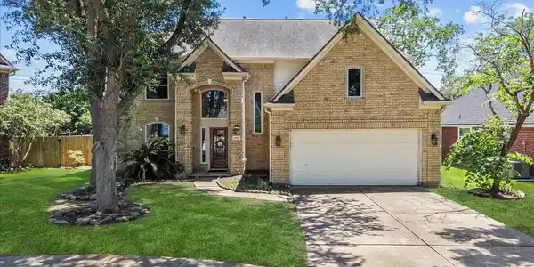 Image 2: Welcome to 1409 Mija Ln! Beautiful two-story brick