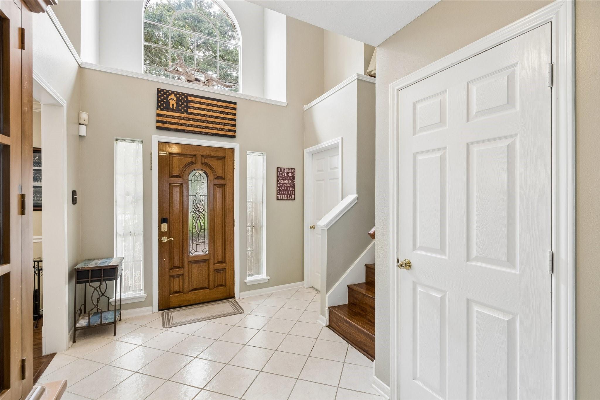 Image 4: Front door, the utility is directly to the right o