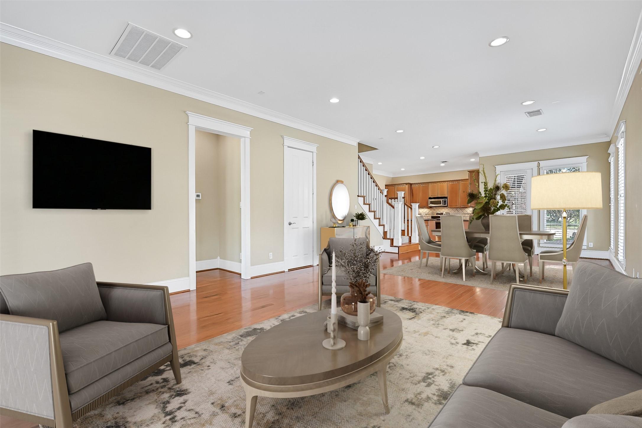 Image 4: Open entertaining areas greet you upon entering. T