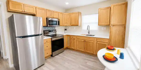 Image 2: Bright and inviting kitchen with stainless steel a