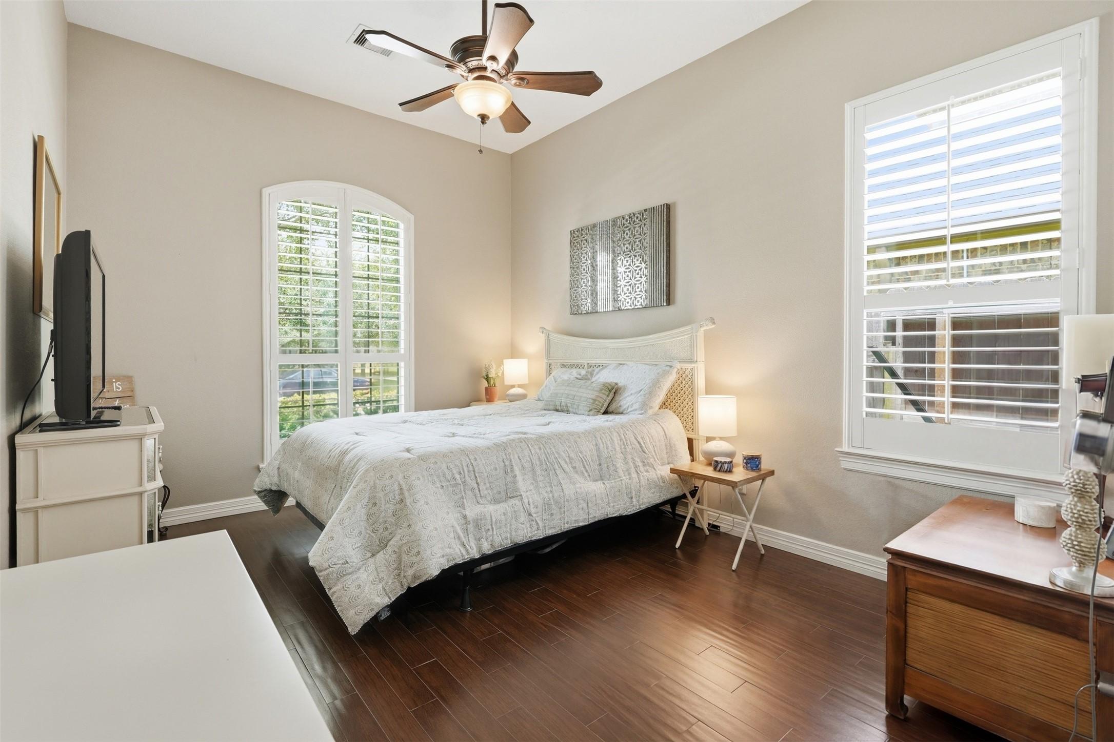 Image 4: Front-facing bedroom with a spacious walk-in close