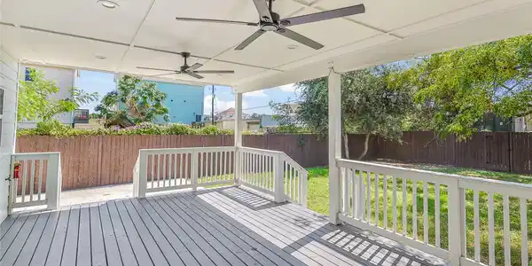 Image 3: A covered outdoor area creates an inviting extensi