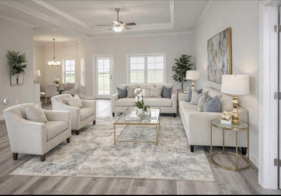 Image 2: This spacious living room features a neutral color