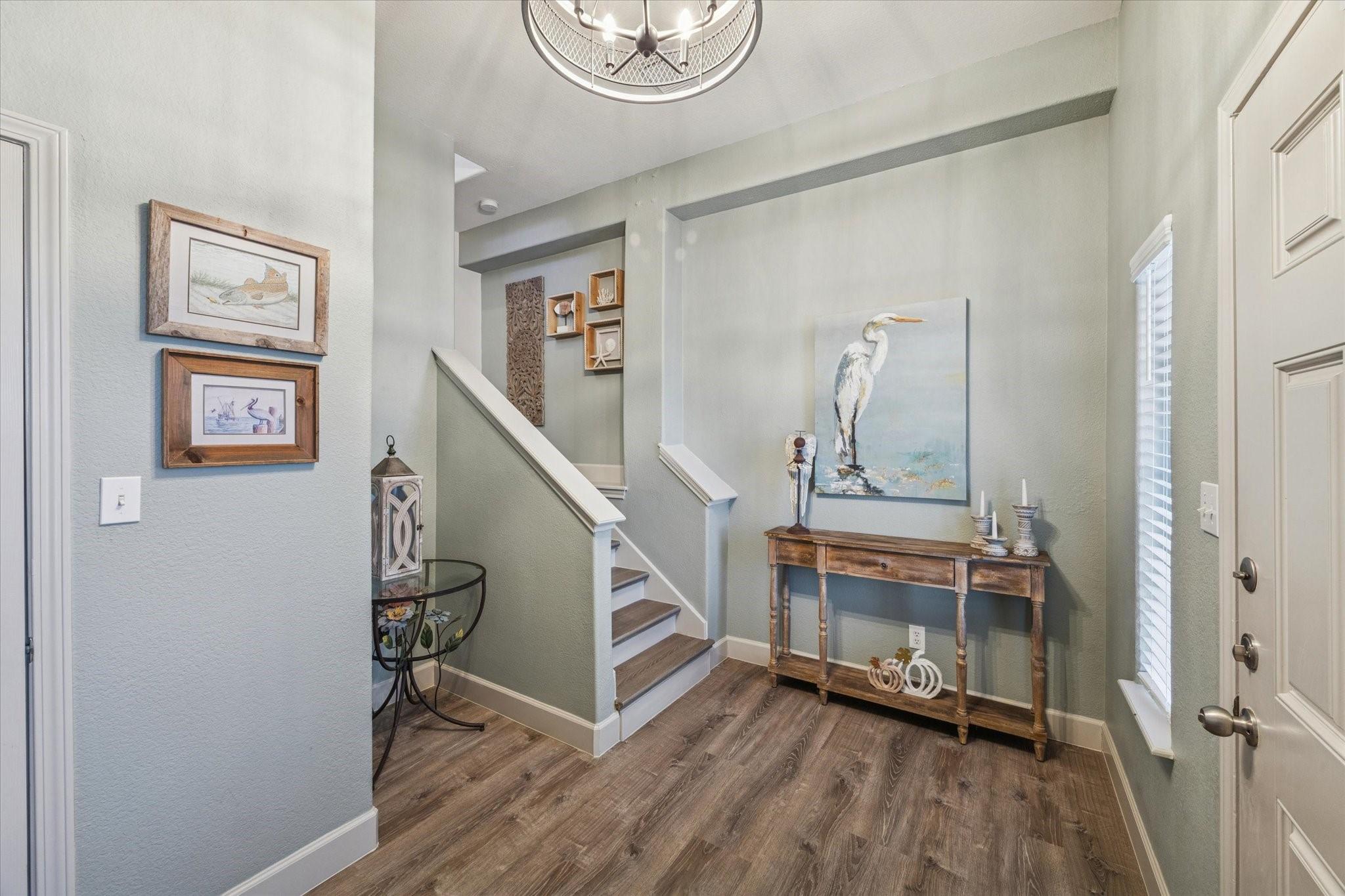 Image 4: Large entry with closet and new wood stairs all th