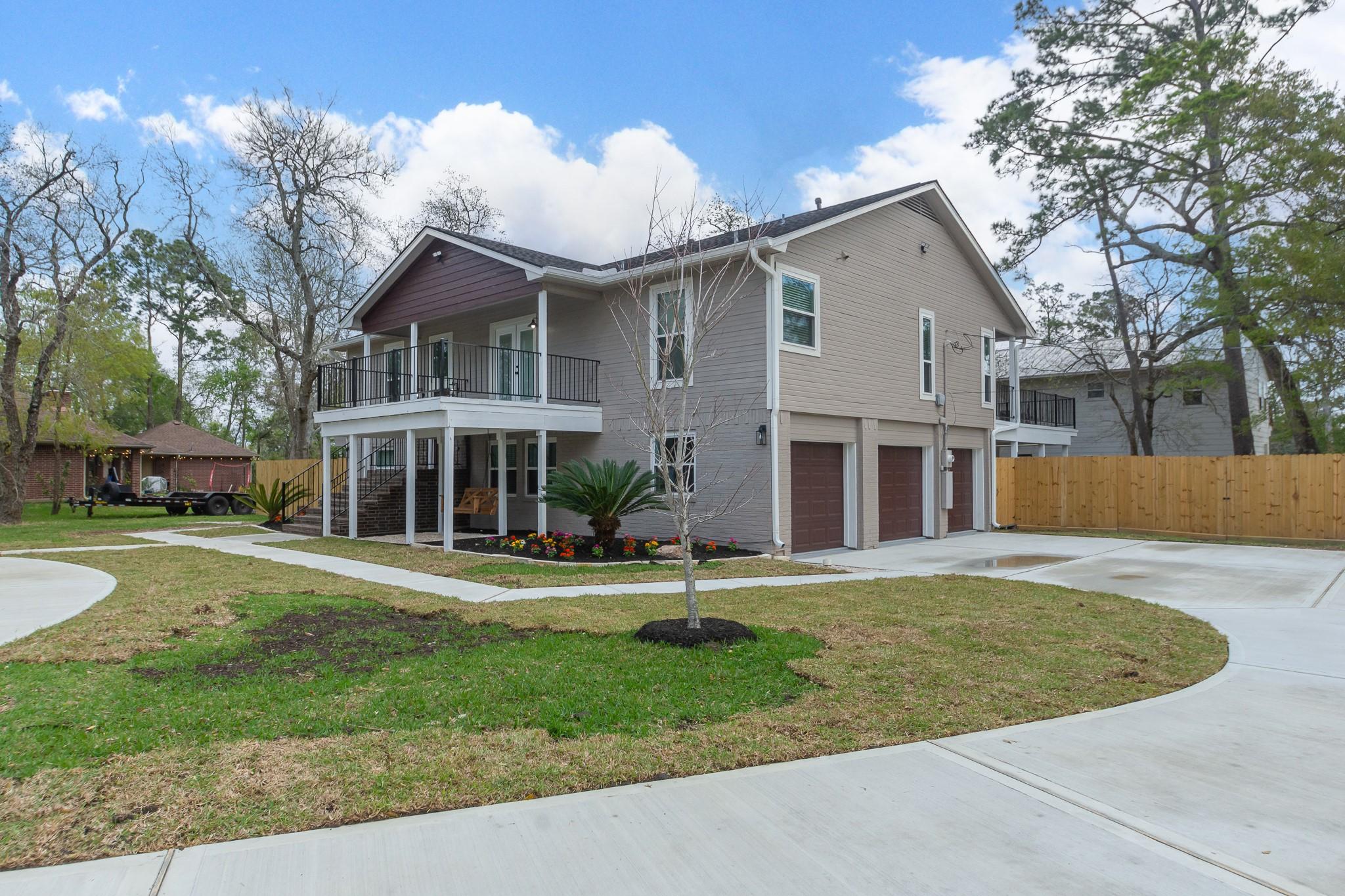 Image 4: The home has a split-level front exterior. The 2nd