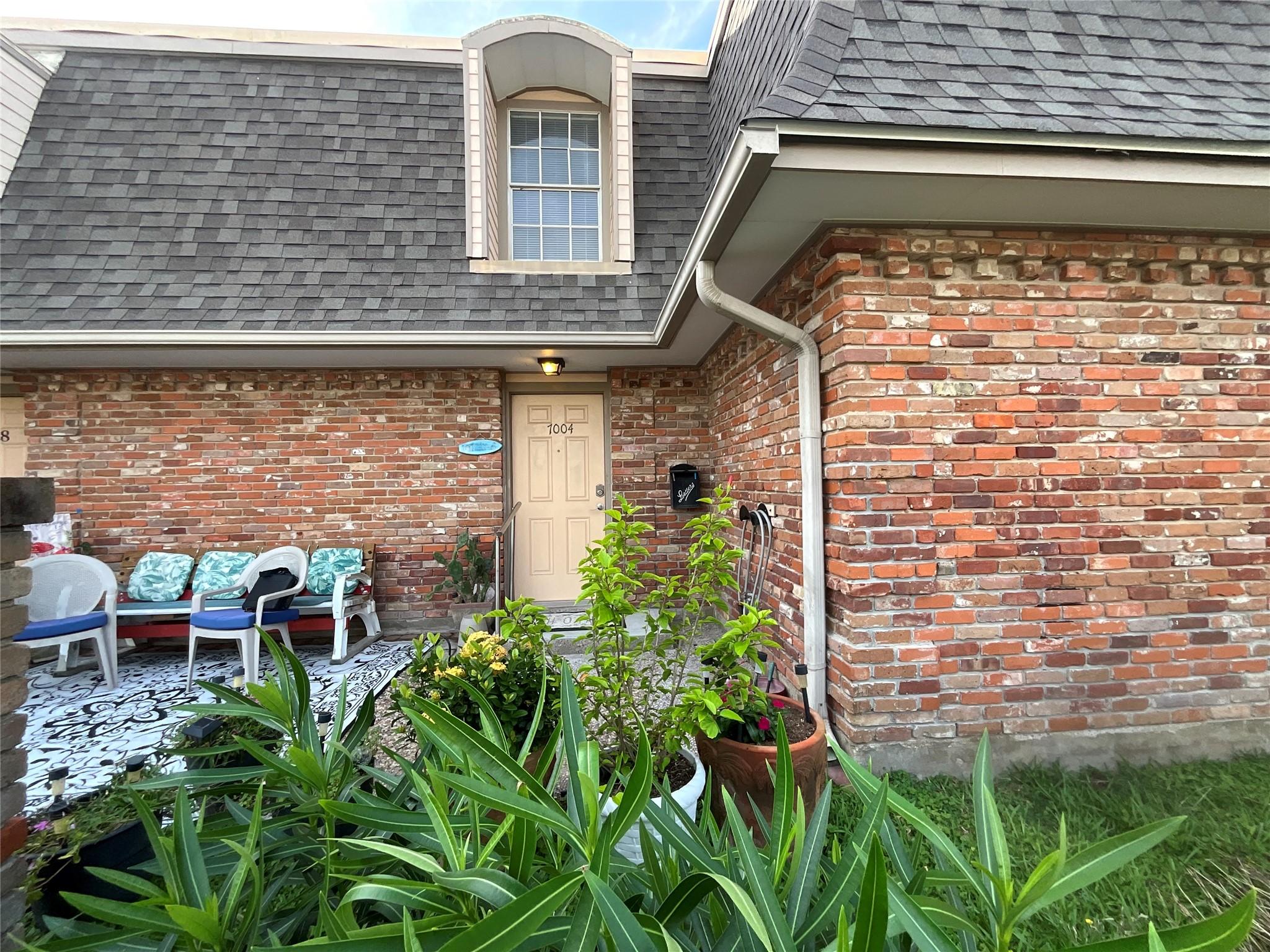 Image 1: Cozy Townhome facing south and approximately 2 blo