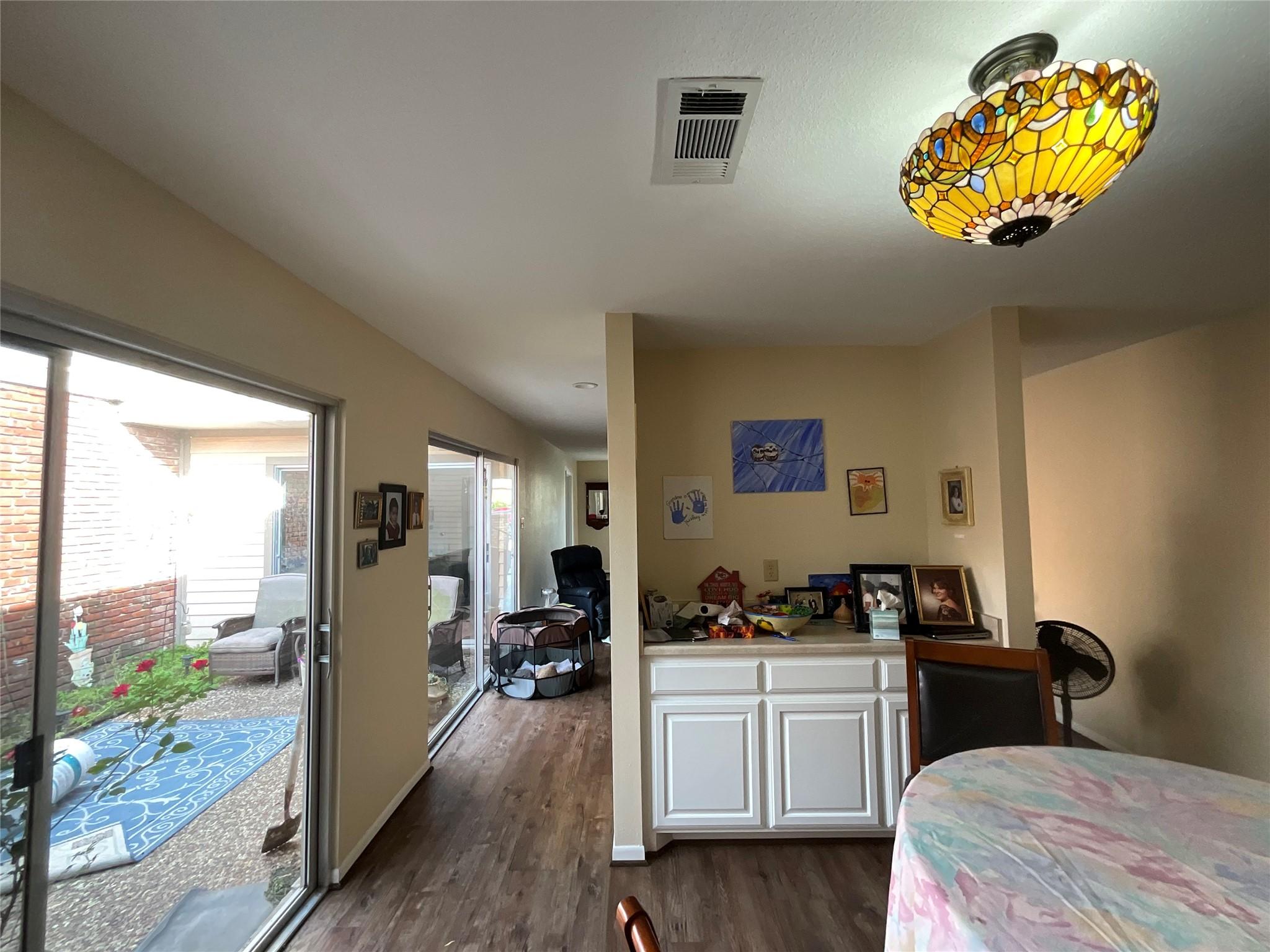 Image 4: Built-in hutch in the dining area.  Create your ve