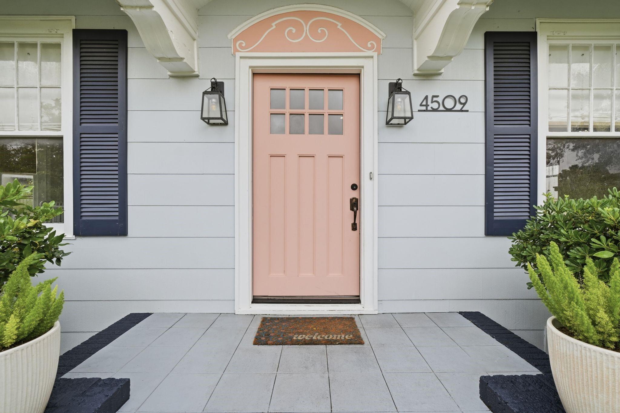 Image 2: Charming front entry featuring a distinctive blush