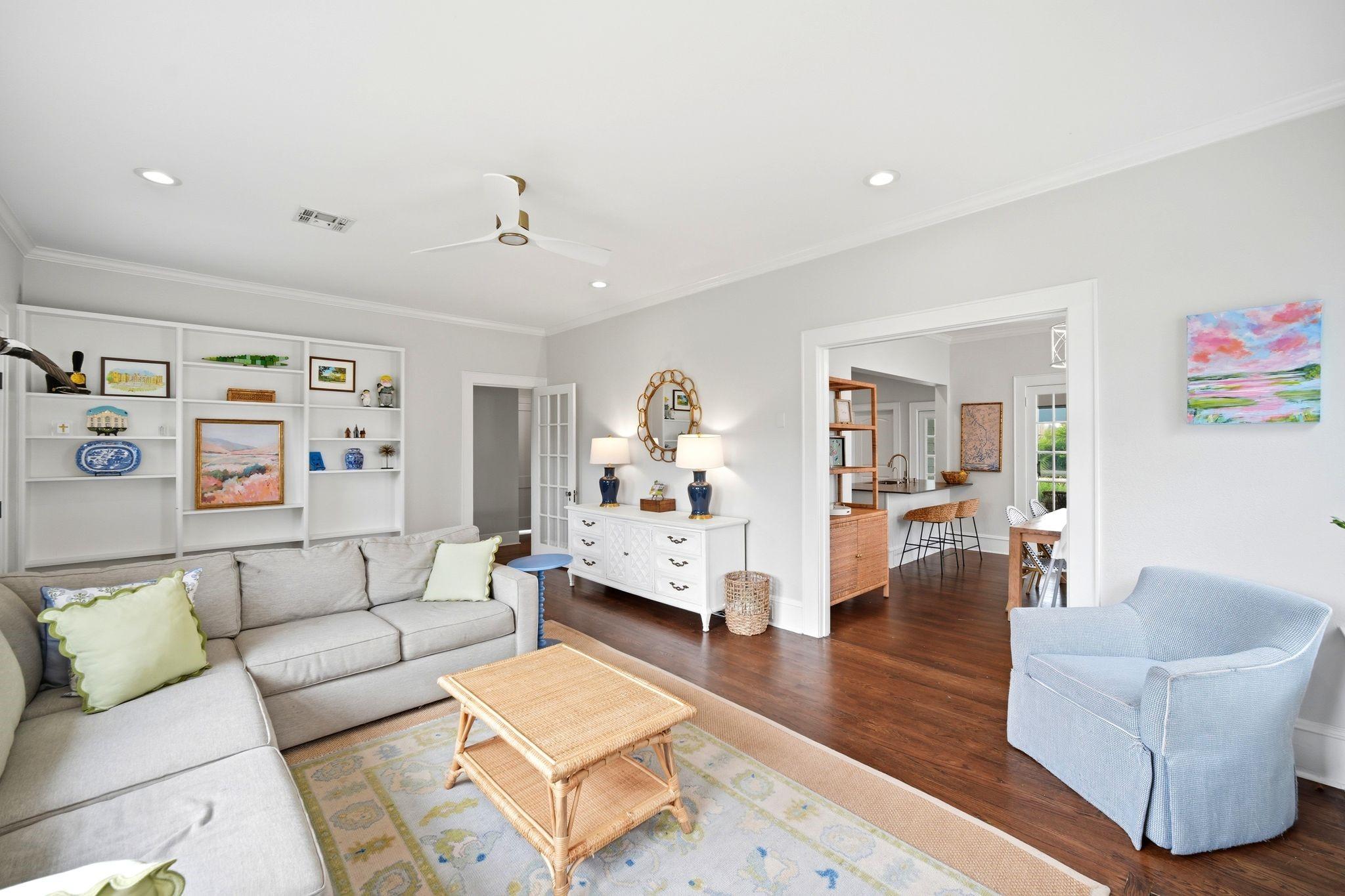 Image 4: Bright and inviting living room featuring hardwood