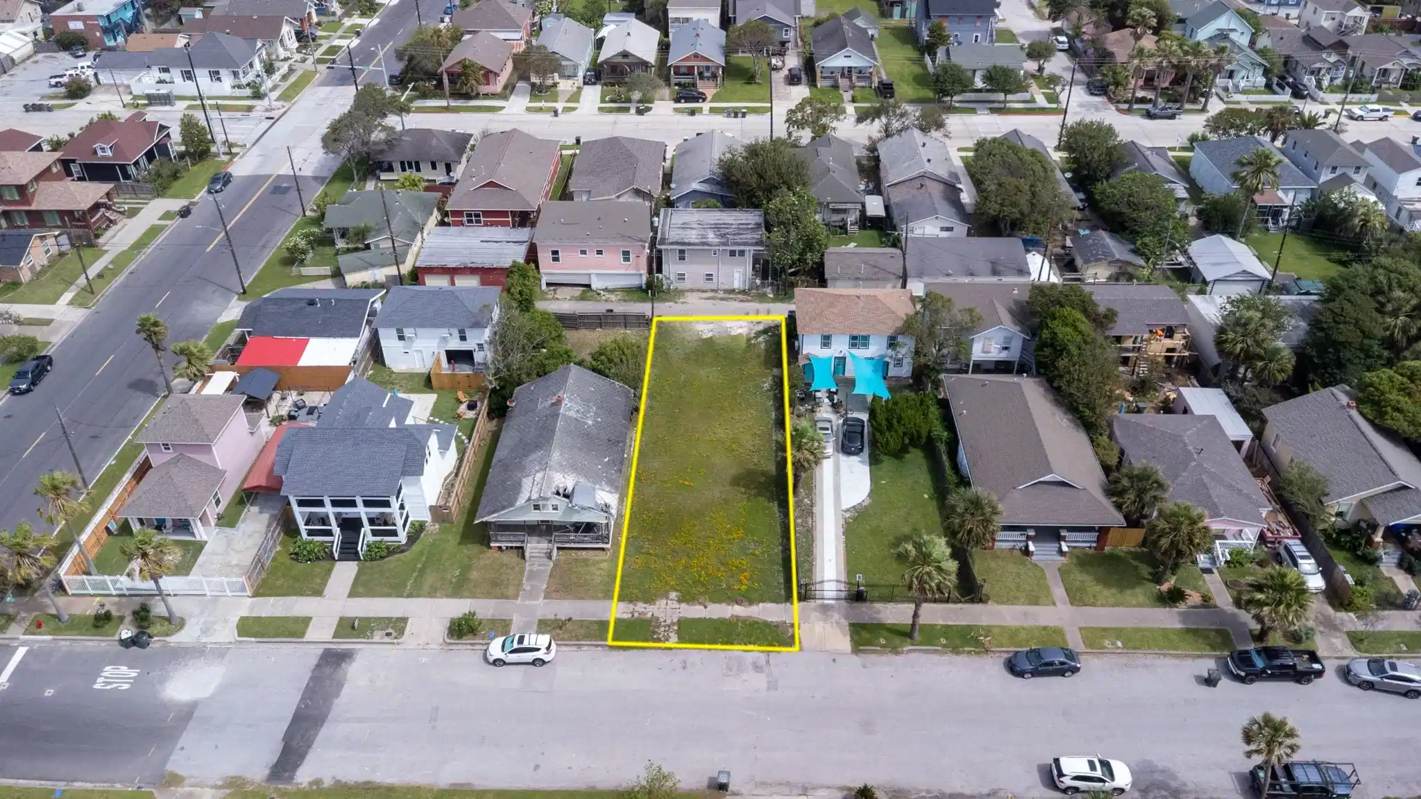 Image 1: Aerial view of the property with Avenue S 1/2 in t