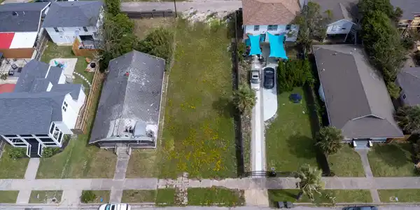 Image 4: Aerial view of the lot. Avenue S 1/2 in the foregr