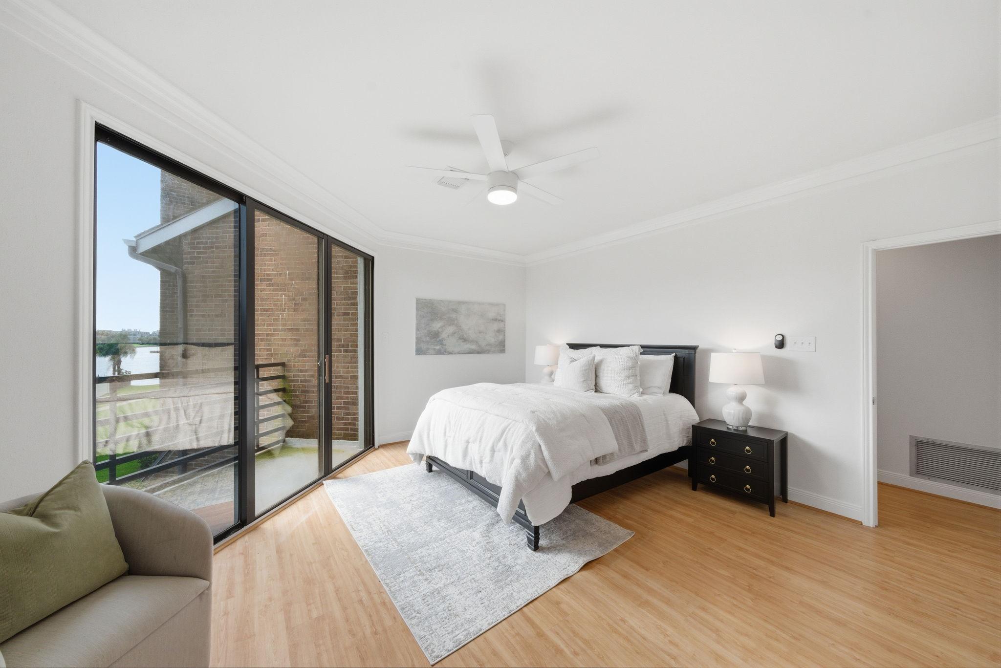 Image 4: PRIMARY BEDROOM OFFERS A SPA-LIKE RETREAT WITH ATT