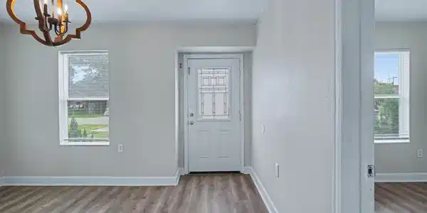 Image 3: Welcoming front entry with fresh interior paint an