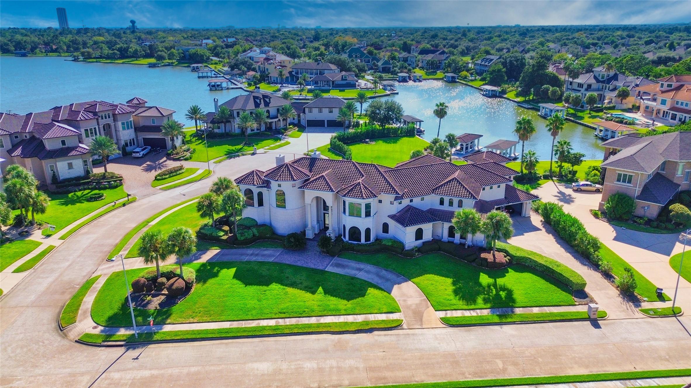 Image 1: Stunning custom waterfront home on almost an acre