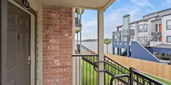 Image 3: This photo shows a welcoming condo entrance with a