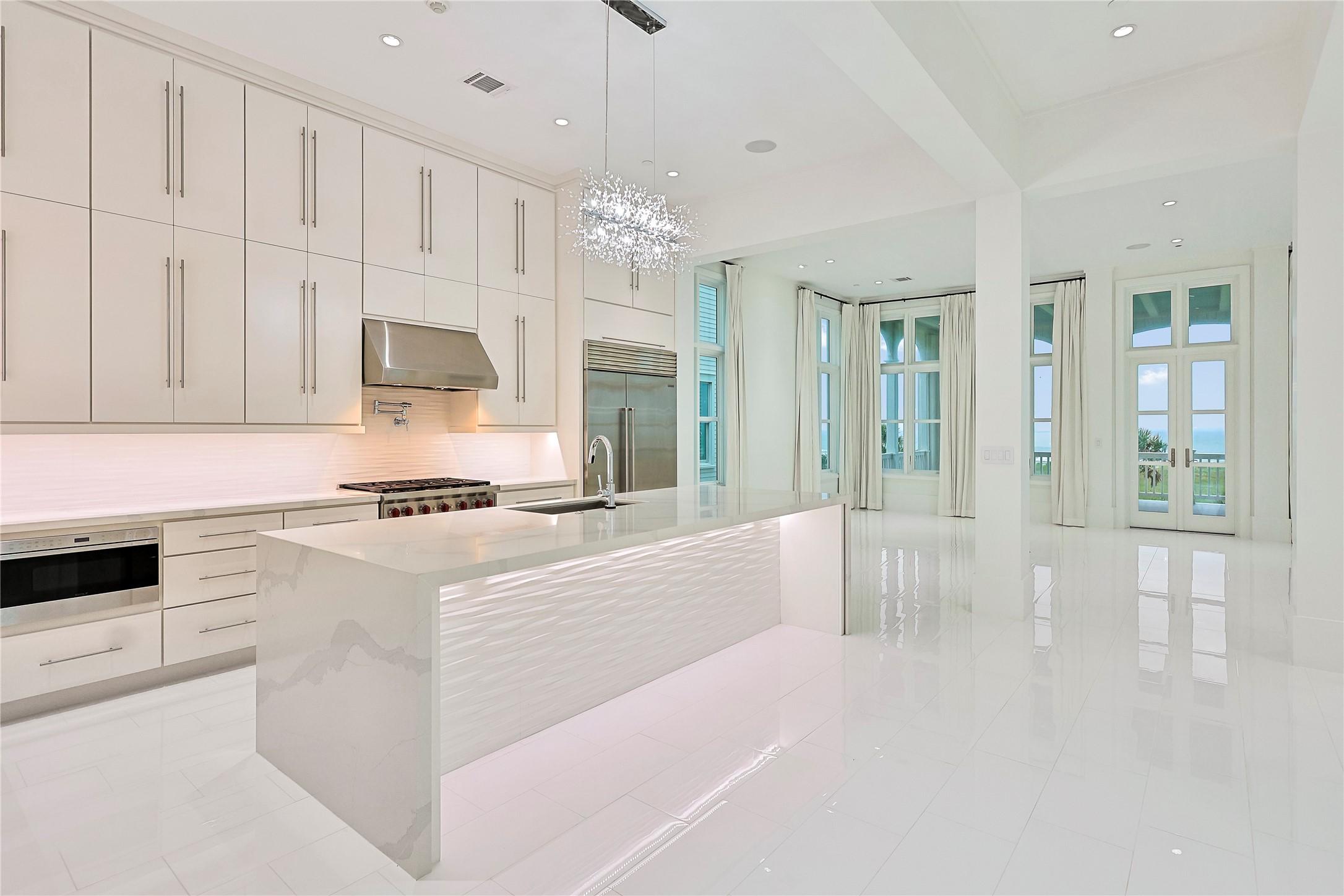 Image 1: The kitchen and living space is truly dream-worthy