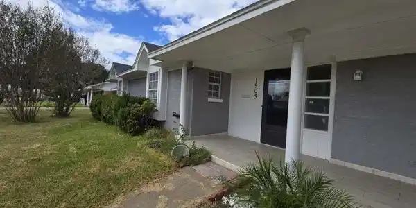 Image 4: Charming single-story home with a spacious front p