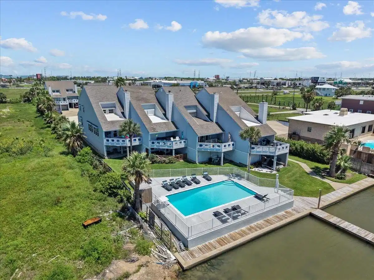 Image 1: Residents enjoy a relaxed coastal lifestyle with b