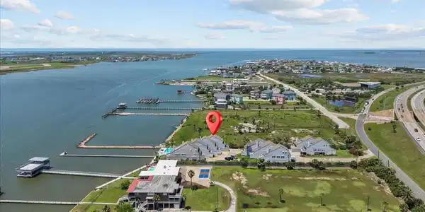Image 2: This aerial view showcases the property's prime ca