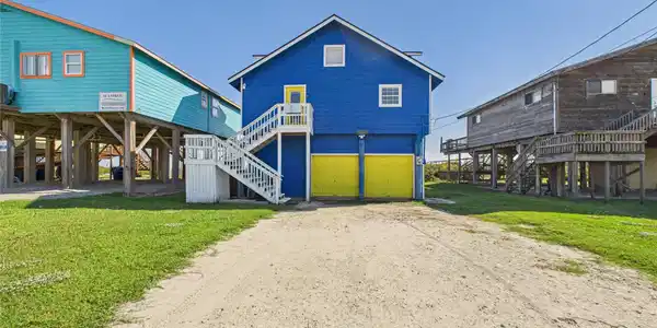 Image 2: Beach front with two-car garage!