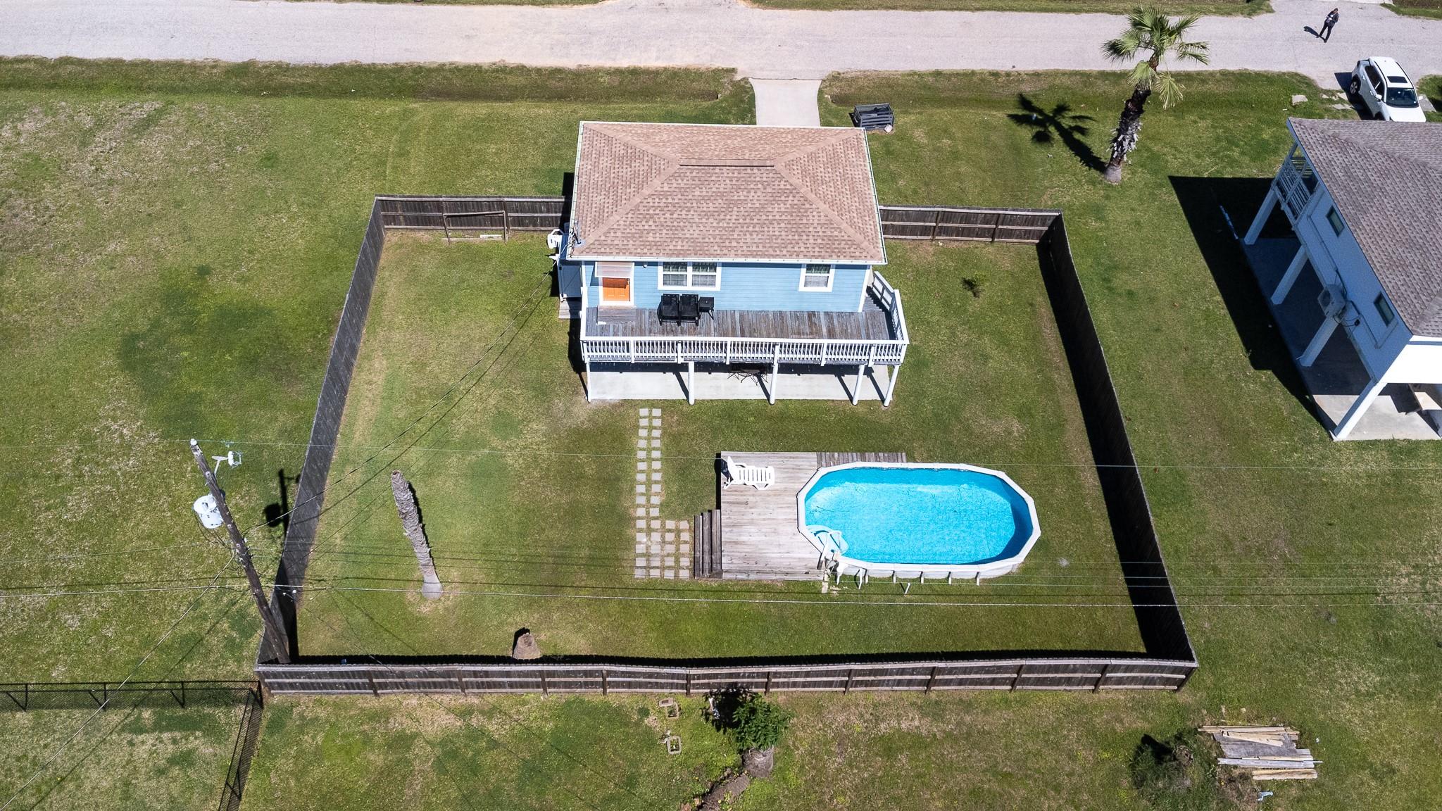 Image 2: Drone  Expansive lot w/ above ground pool/deck.  N