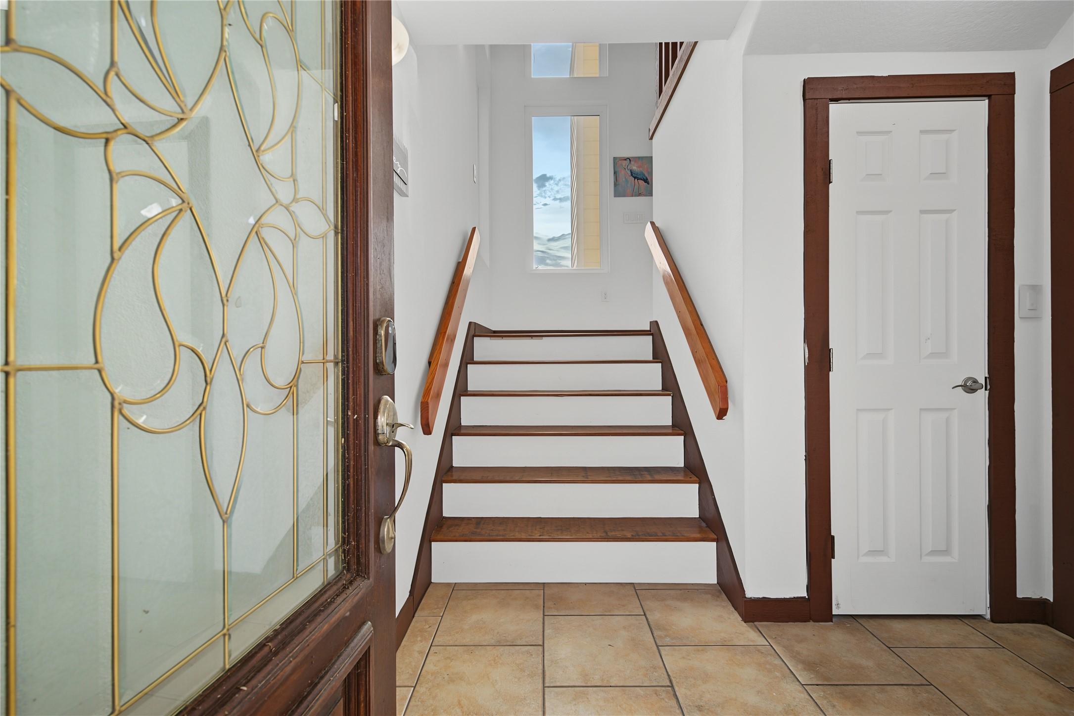 Image 4: Inside the front door on the ground level. Up stai
