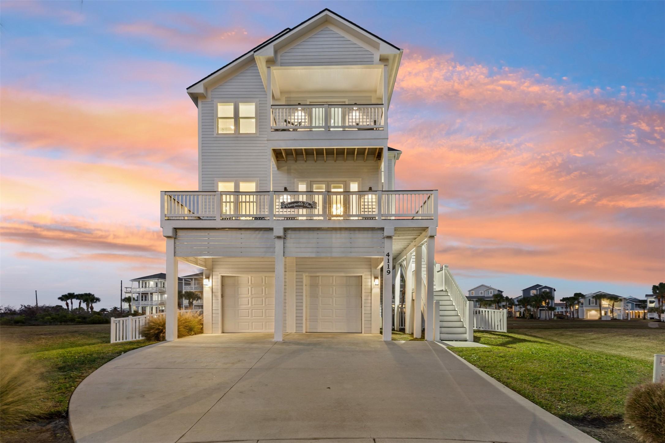 Image 2: Elevated coastal home with 4 beds, 4 baths, dual-b