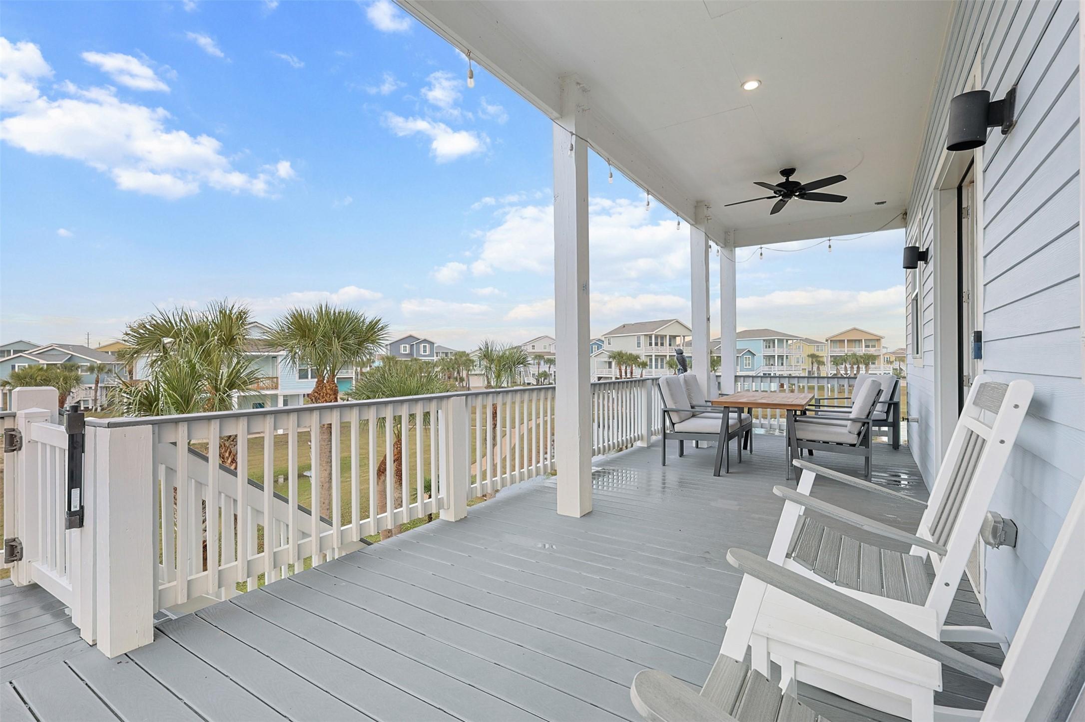 Image 3: Covered balcony with composite decking, white rail