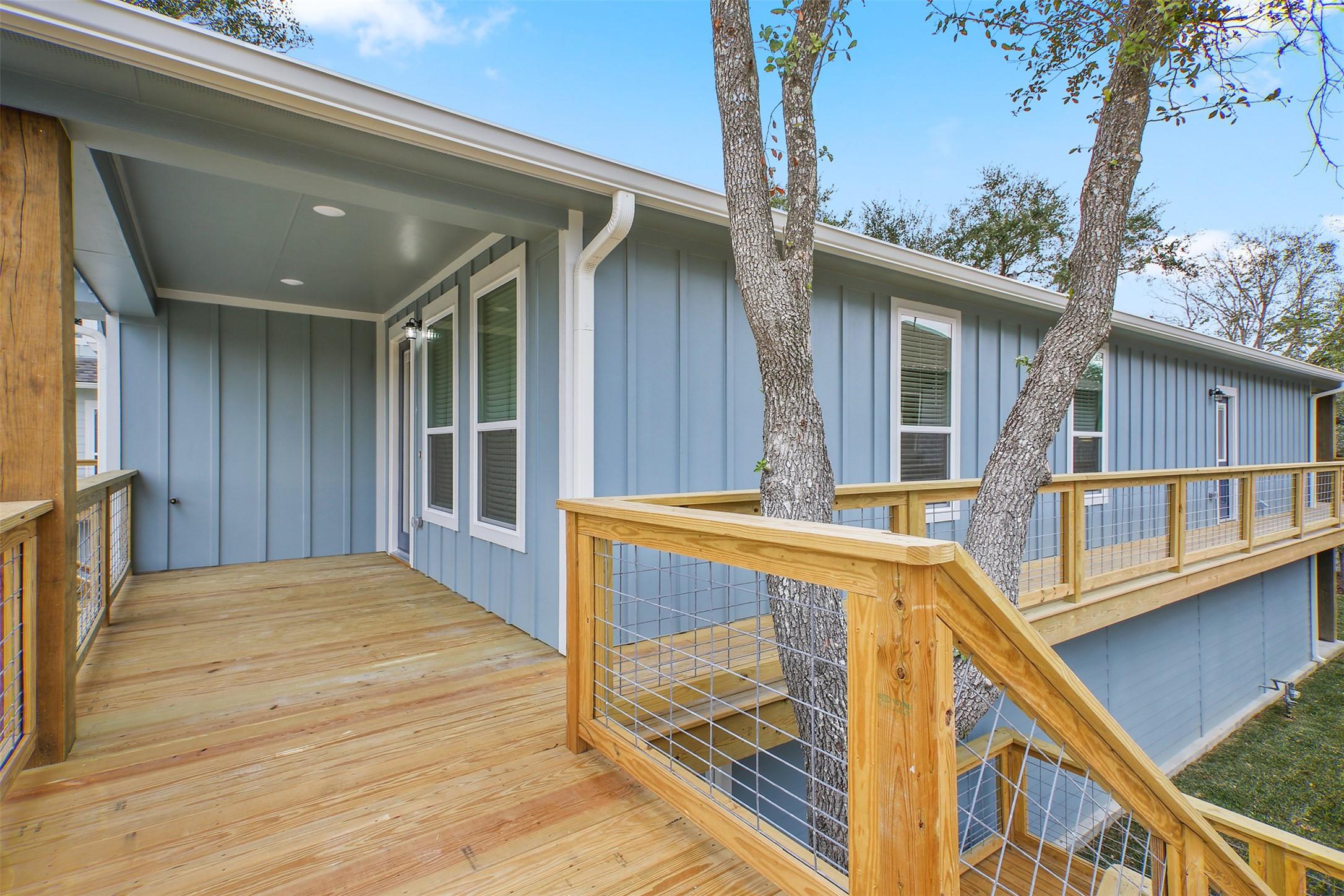 Image 2: View of the front porch with wrap-around porch.
