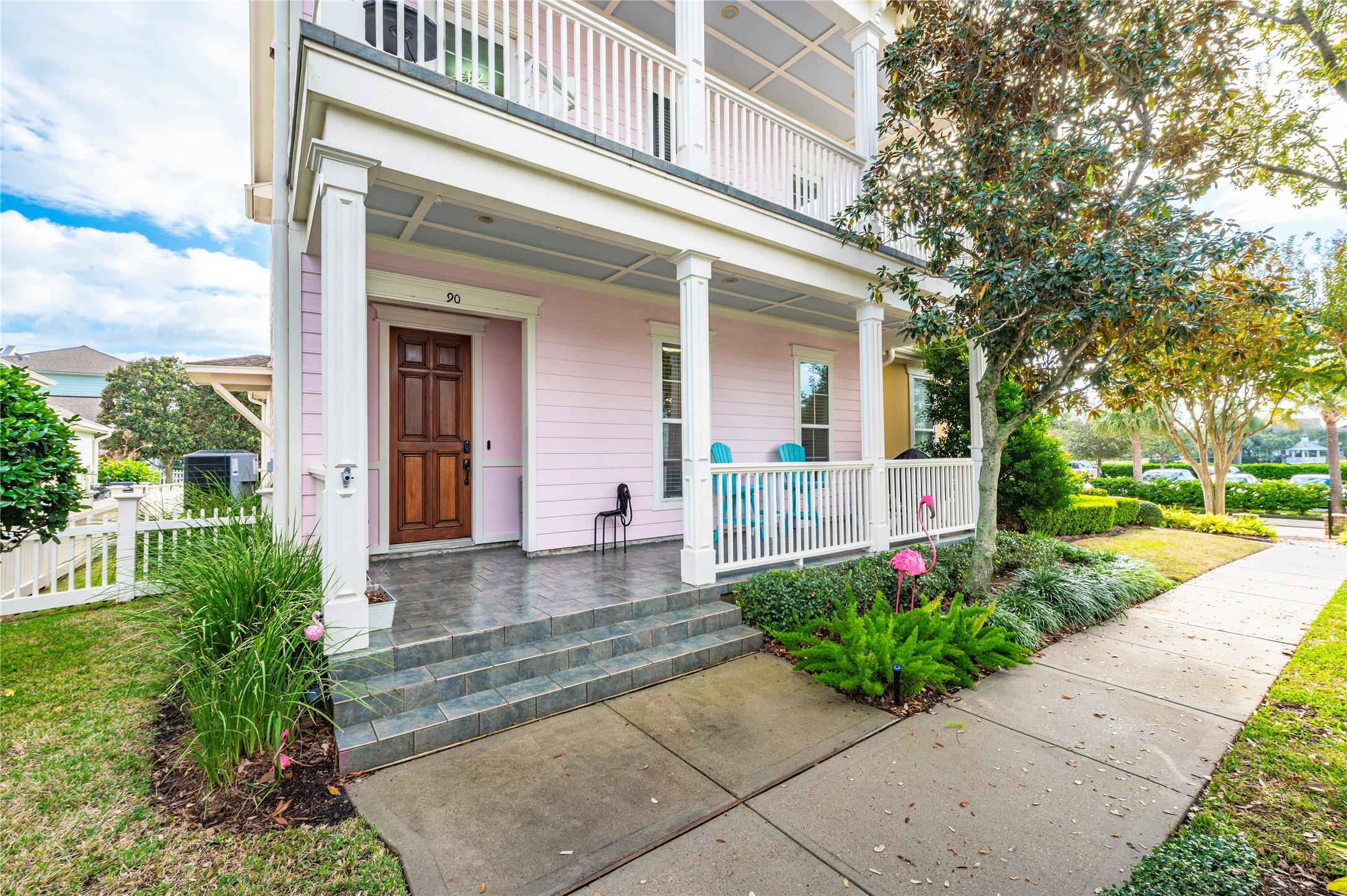 Image 3: The front porch is a welcoming spot to enjoy your