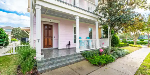 Image 3: The front porch is a welcoming spot to enjoy your