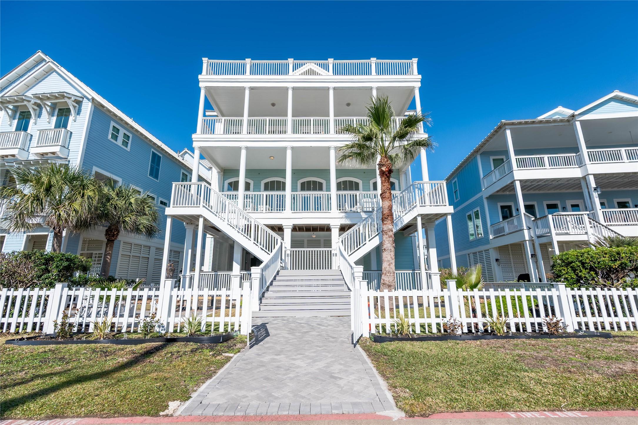 Image 3: This massive coastal retreat features three levels