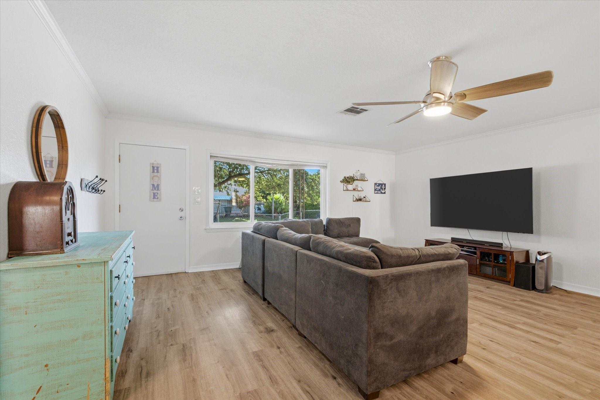 Image 4: The new windows add tons of natural light to the l