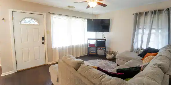 Image 2: living room with lots of natural light
