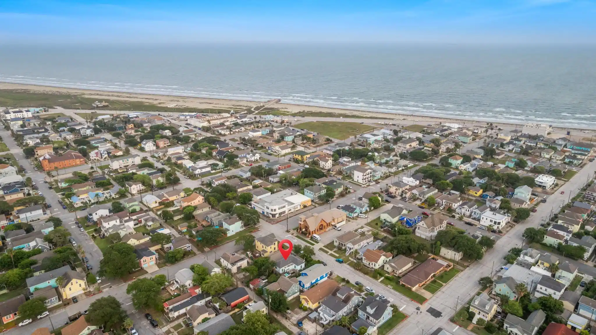 Image 1: Beachside Neighborhood &ndash; Wide aerial perspective h