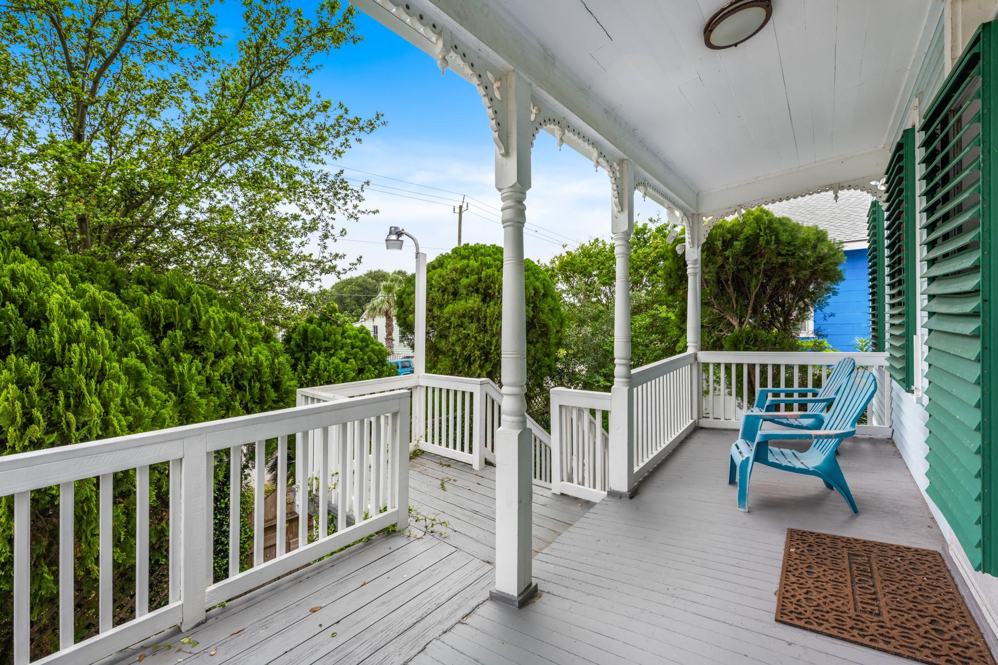 Image 3: Inviting covered front porch featuring classic arc