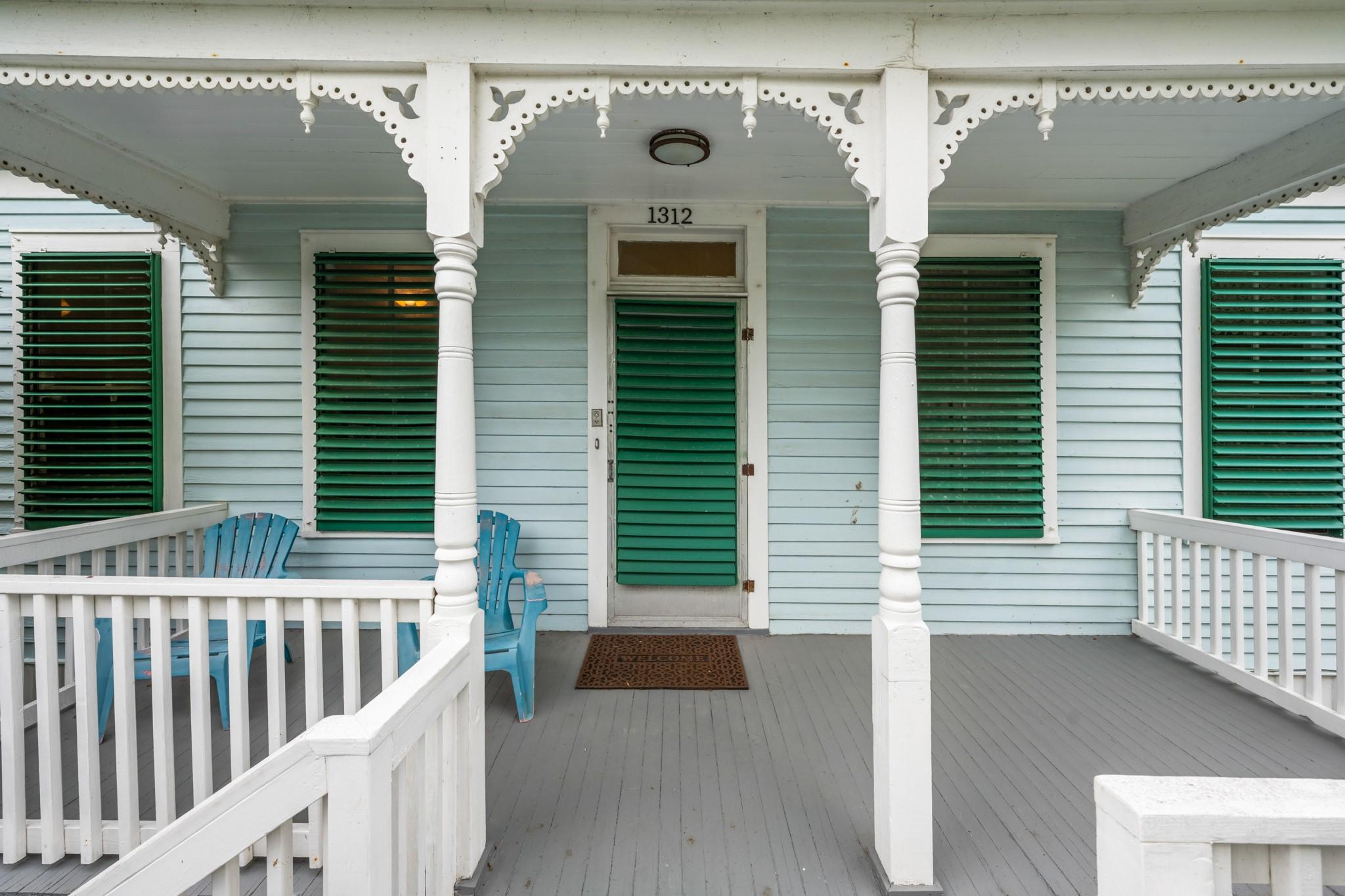 Image 4: Charming front entry highlighted by decorative tri