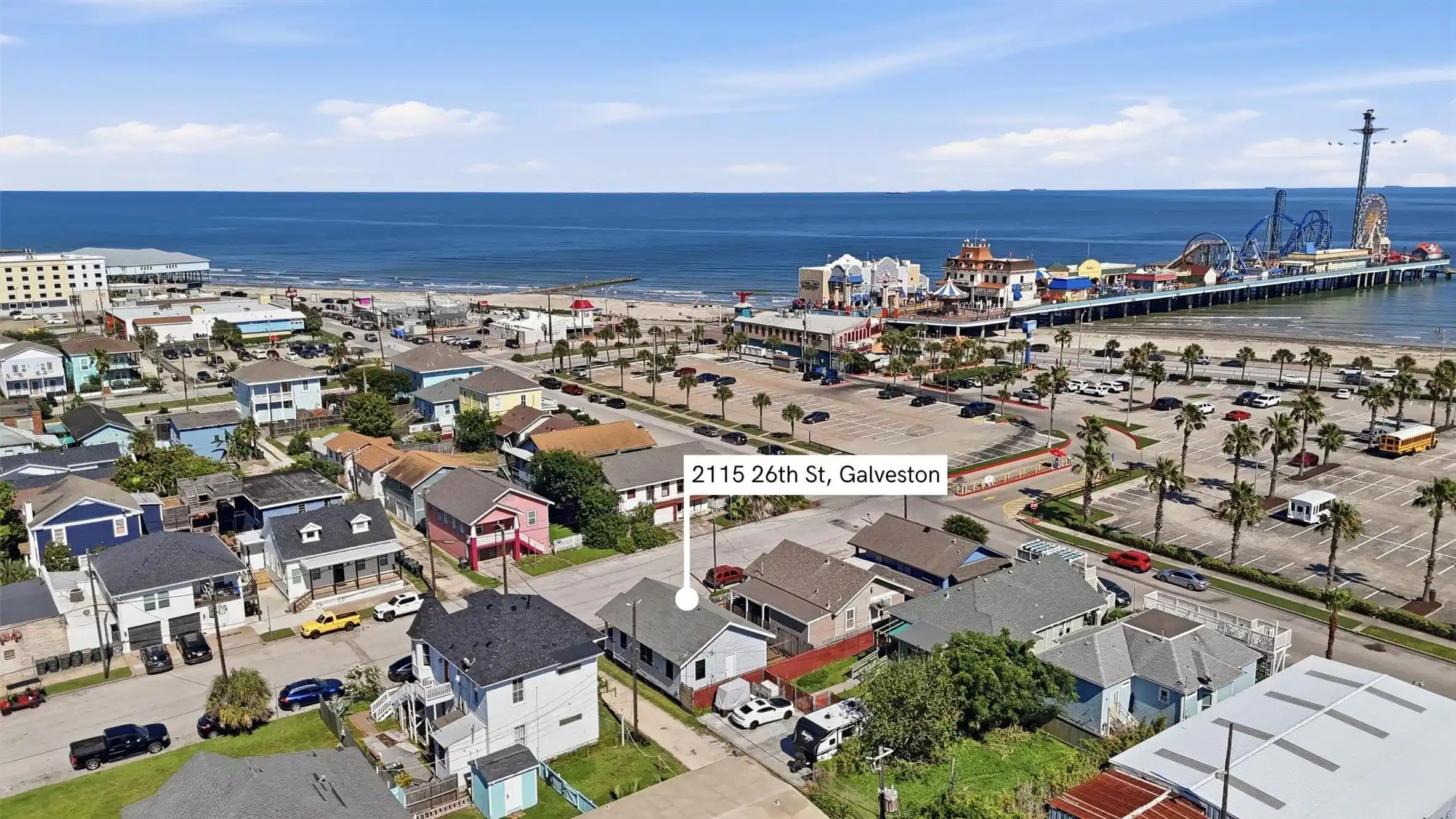 Image 1: Just steps from the Seawall, this home places you