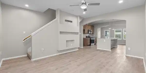 Image 3: Open-concept design connects the living, kitchen a