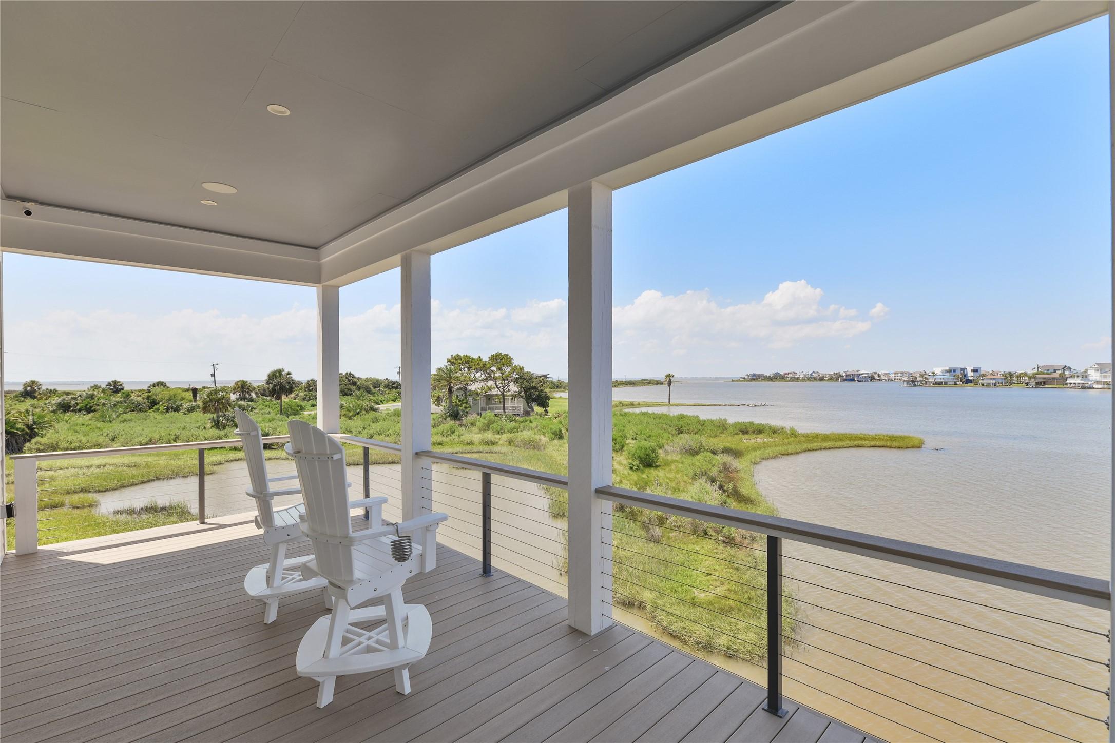 Image 4: Start your day on the first-level deck, where peac
