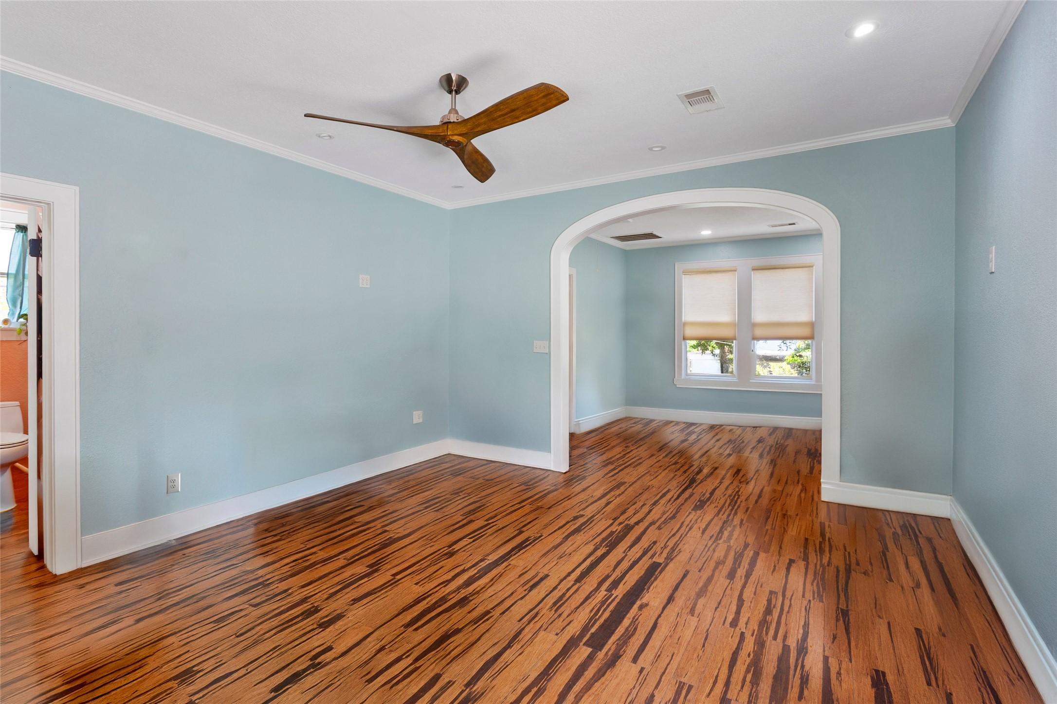Image 3: This room features a spacious layout with stylish
