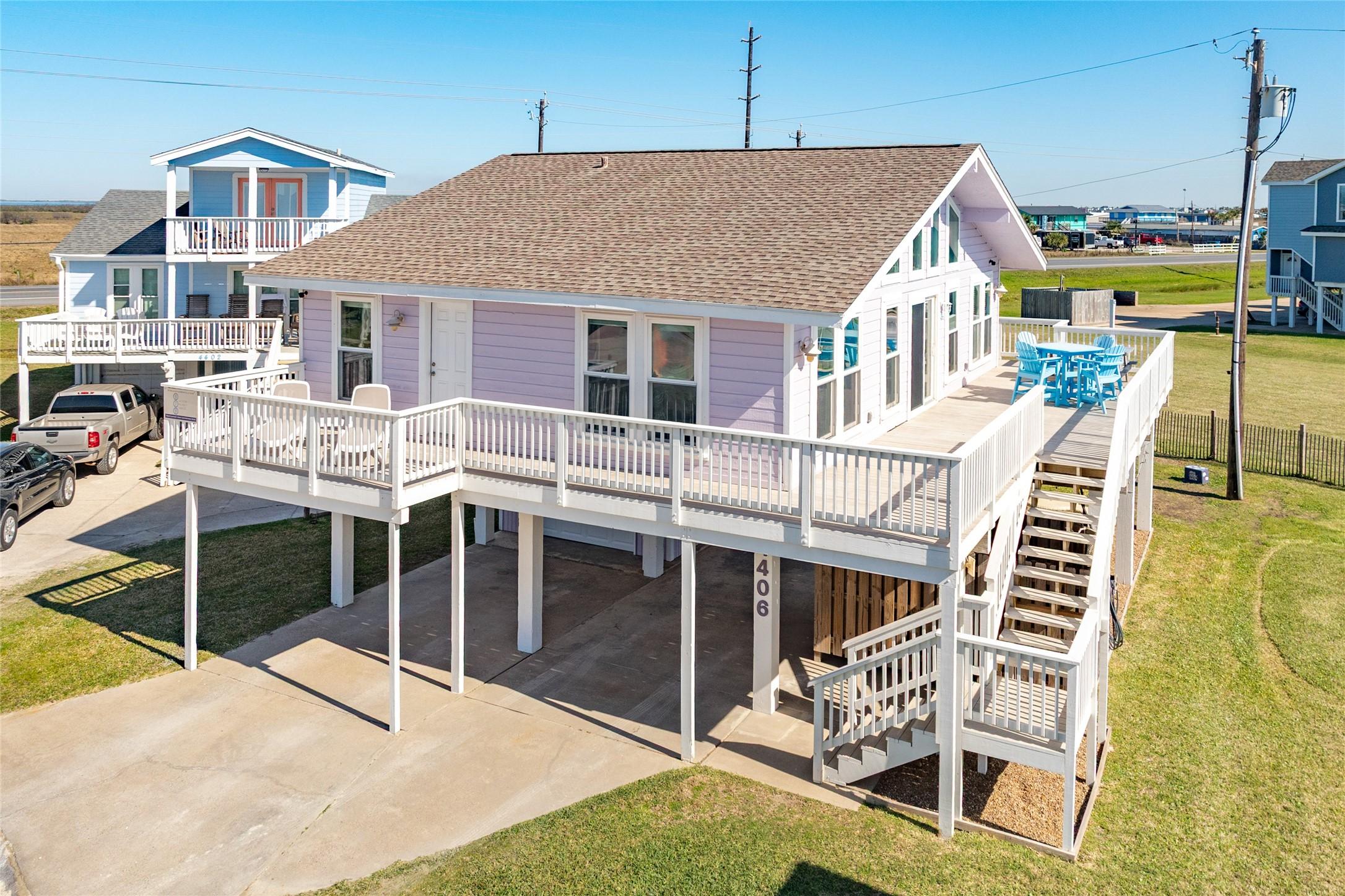 Image 3: Covered parking, a spacious garage, and lots of de