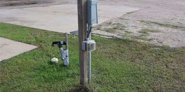 Image 3: This photo shows utility hookups, for RVs or trail