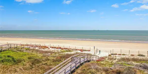 Image 2: Enjoy the gates golf cart-accessible beach walkove