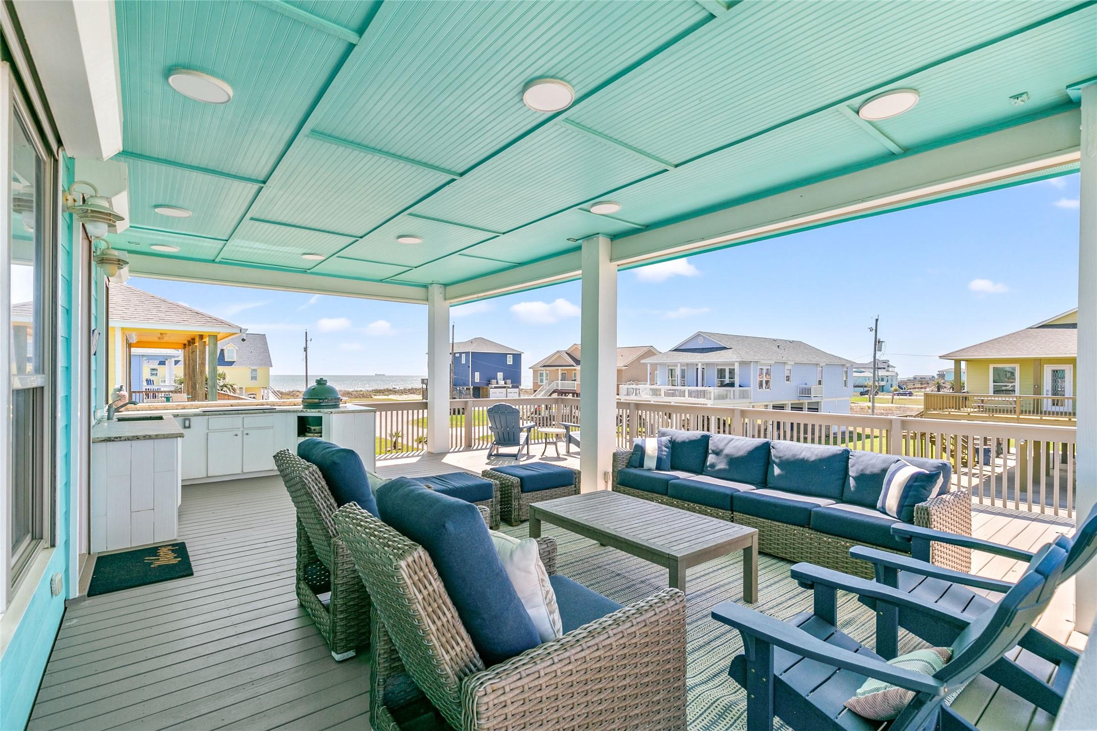Image 3: Expansive front deck designed for coastal living!