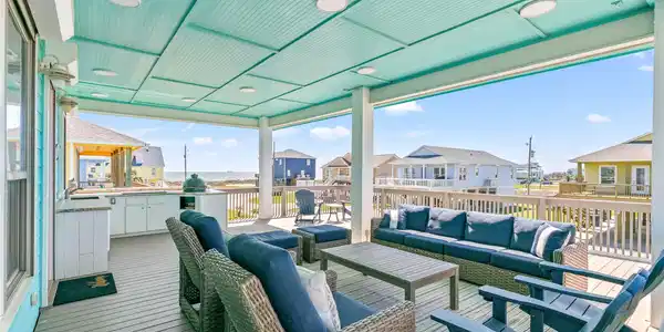 Image 3: Expansive front deck designed for coastal living!