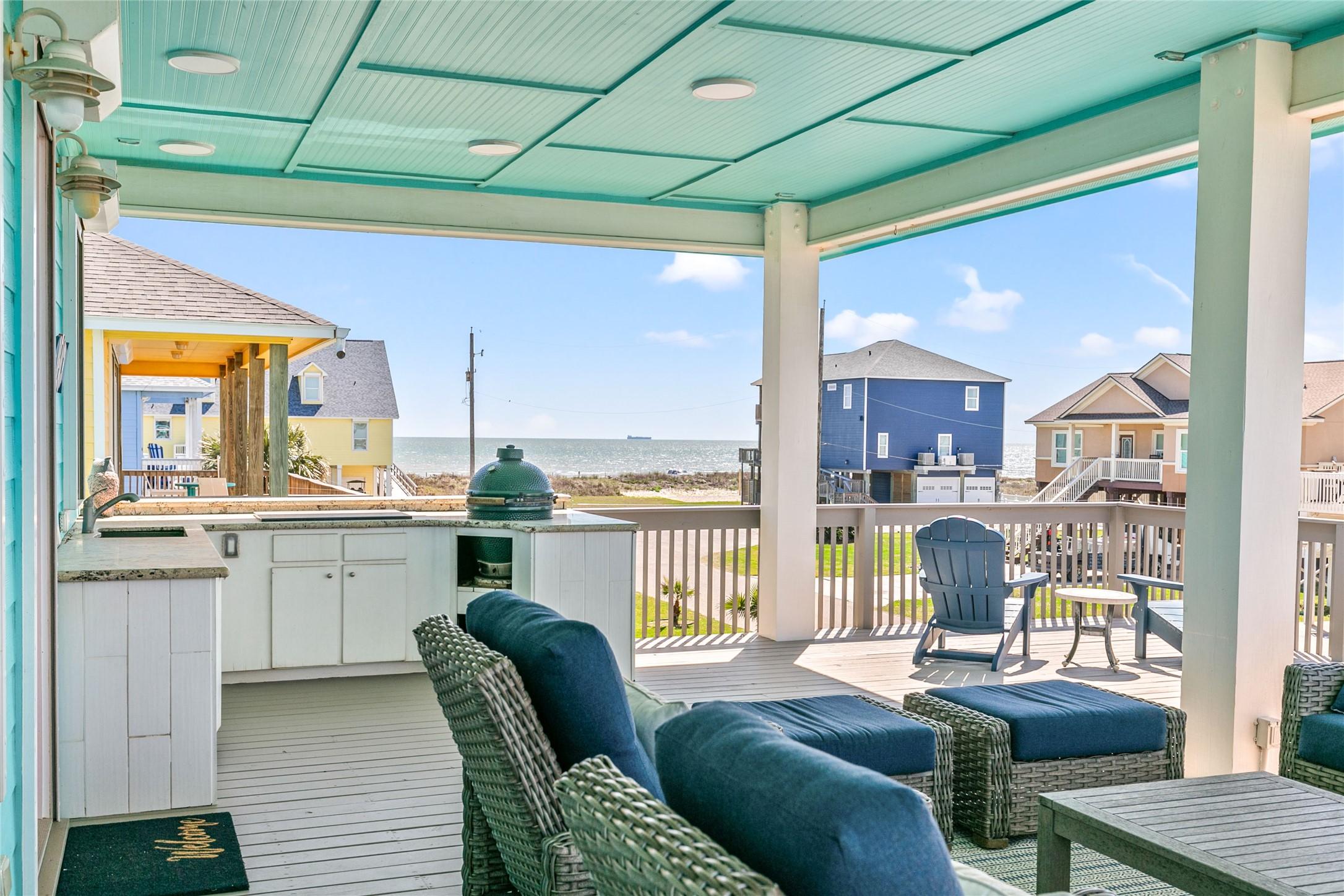 Image 4: Expansive front deck designed for coastal living!