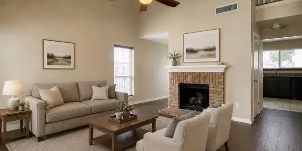Image 4: Family room featuring a brick fireplace, high ceil
