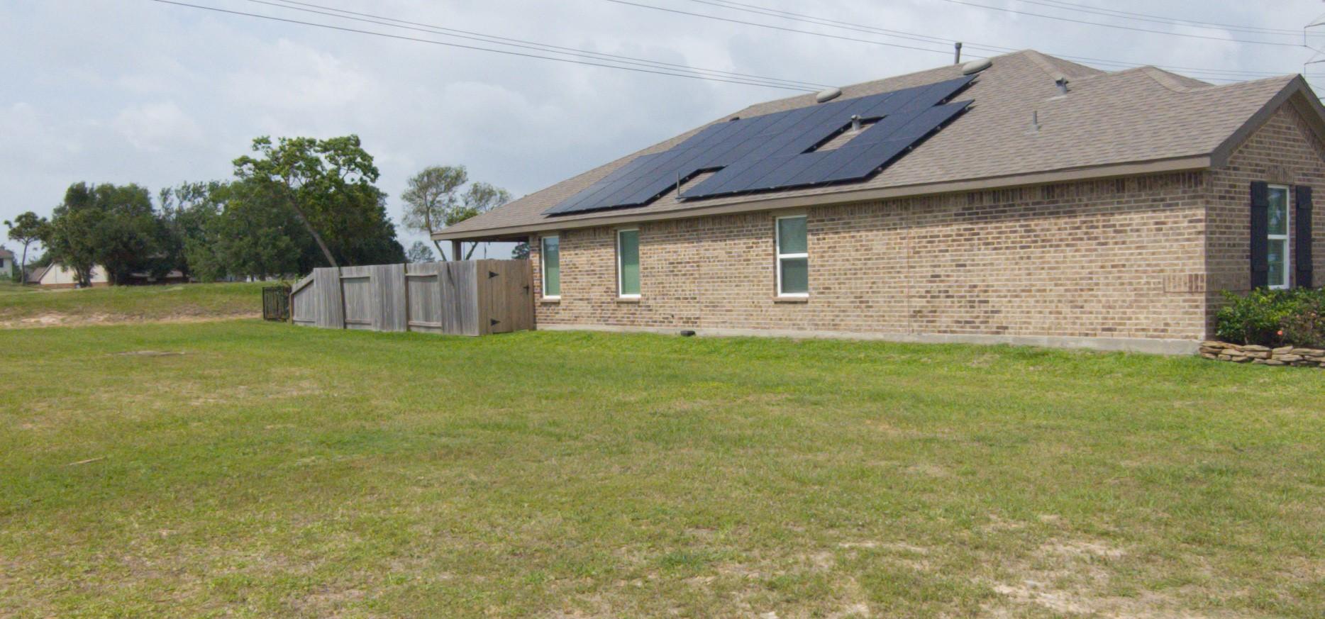 Image 3: Experience eco-friendly living with this home's ex